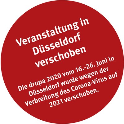 Roter Kreis mit der Aufschrift "Veranstaltung in Düsseldorf verschoben Die drupa 2020 vom 16.-26. Juni in Düsseldorf wurde wegen der Verbreitung des Corona-Virus auf 2021 verschoben."
