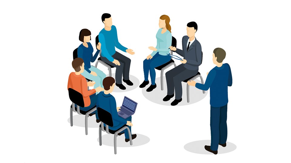 Illustration, die symbolisch für die Vertreterversammlung der BG ETEM steht: Sechs Personen sitzen im Halbkreis, eine Person steht und spricht zu ihnen.